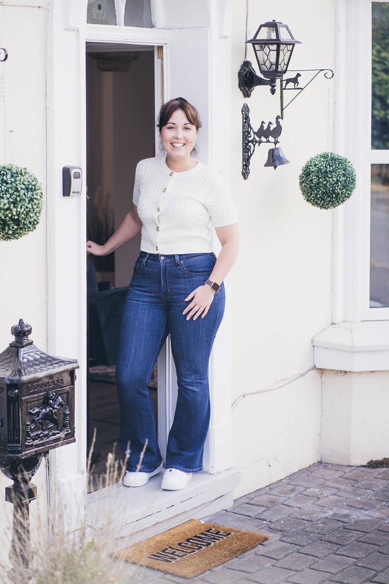 Aniko Rucz in the doorway of one of her holiday lets